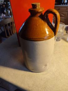 Stoneware flagon with cork.
