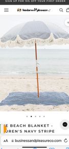 New business and pleasure Lauren's navy stripe beach blanket