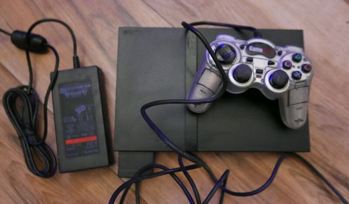 Playstation 2 slim - PS2 slim (works well)