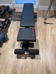 weight bench and dumbells