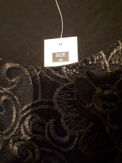 New black lace top no sleeves tag attached