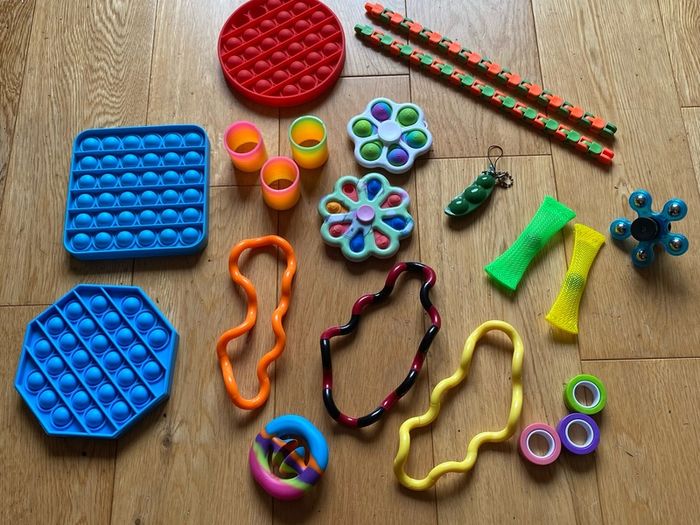 Collection of 35 Pop sockets, squishy, whacky tracks etc