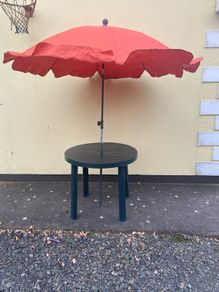 Garden table and parasol