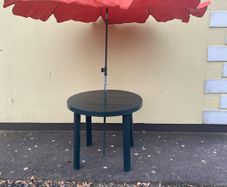 Garden table and parasol