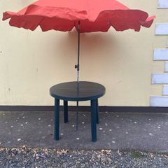 Garden table and parasol