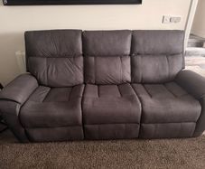 Three-seater electric reclining sofa