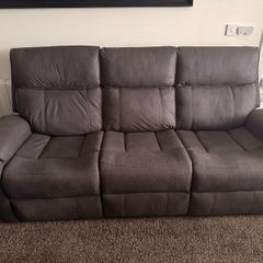 Three-seater electric reclining sofa