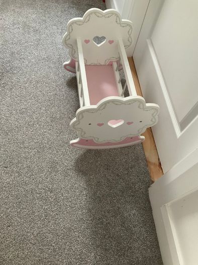 Wooden dolls cot