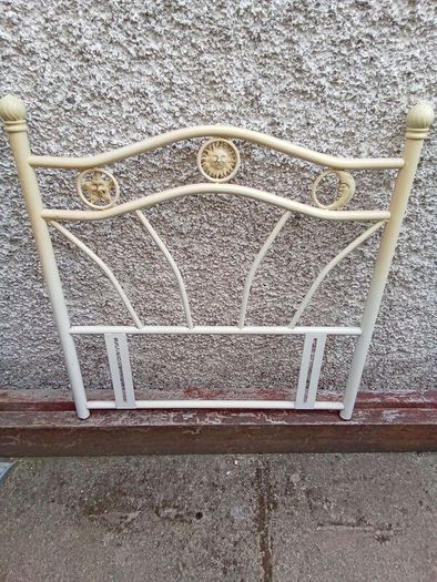 Metal single bed head frame.