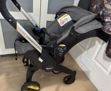 Doona+ Infant Car Seat and Stroller | Buggy + Wind Cover + Rain Cover + Sun Cover