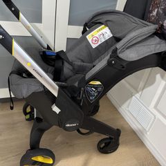 Doona+ Infant Car Seat and Stroller | Buggy + Wind Cover + Rain Cover + Sun Cover