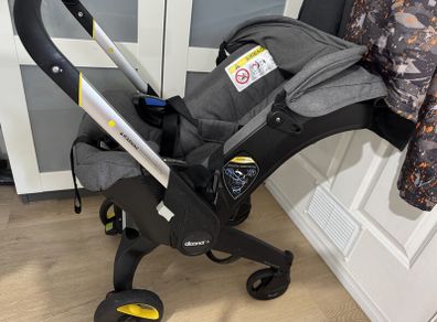 Doona+ Infant Car Seat and Stroller | Buggy + Wind Cover + Rain Cover + Sun Cover