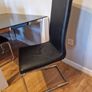 Modern Black Glass Dining Table Image 2
