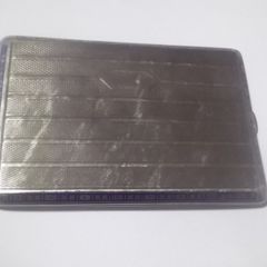 a solid silver cigarette case   stamped 900