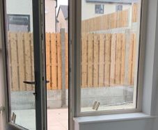Outdoor glass door with oak