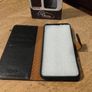 Black Multi functional phone case.  New in box. Image 4