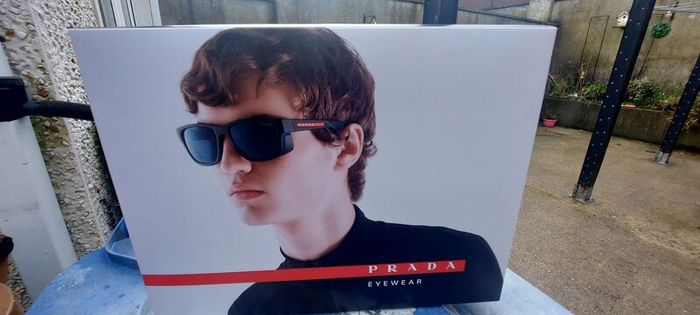 2 x glasses advertising double sided showcards displays items,,nice condition, well known brands , sold as seen ,