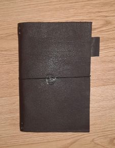 Handmade leather personal size diary notebook passport holder 17cm x 11cm contains a  pen loop a pocket holder and a homemade notebook also with 4 internal elastics to hold your diaries notebooks etc see all photos FREE STANDARD POSTAGE INCLUDED