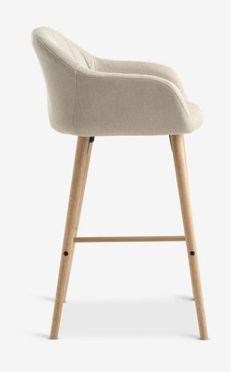 4 beige dining chairs and 2 counter stools
