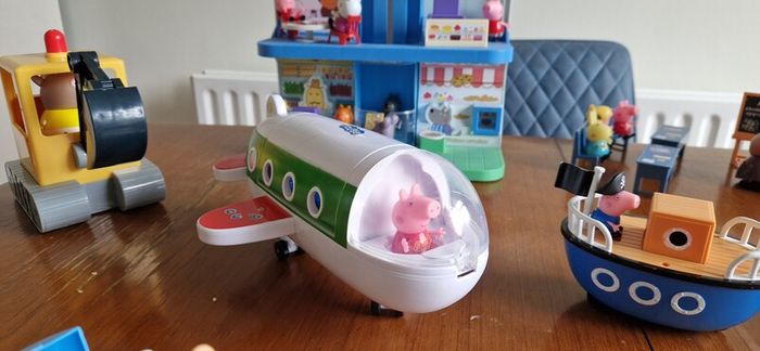 Assortment of peppa pig toys