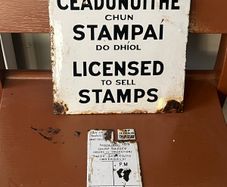 Original Enamel signs license to sell stamps. Collection times and days