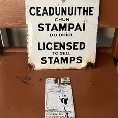 Original Enamel signs license to sell stamps. Collection times and days