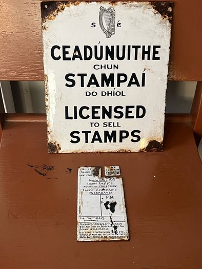 Original Enamel signs license to sell stamps. Collection times and days