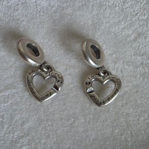 Pandora linked sister hearts split dangle charm. Very good condition hallmarked