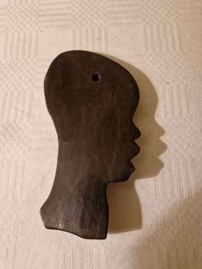 African carved black wood profile silhouette wall hanging