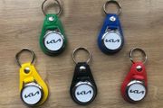 Brand new synthetic leather Kia key ring with shopping trolley token/coin