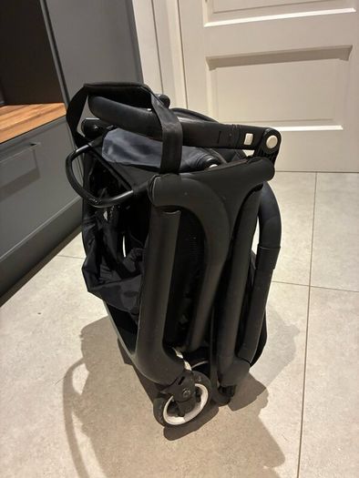 Bugaboo Butterfly with rain cover, standing board