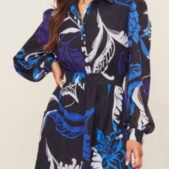 Lipsy Dress in Size 12 - worn only once, gorgeous shades of blue on black background