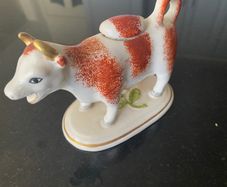 Reduced Staffordshire 19th  century  red and white Daisy cow creamer