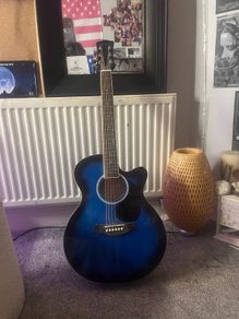 Blue acoustic bass guitar