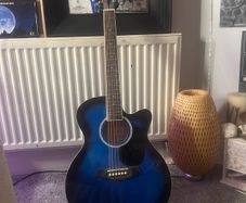 Blue acoustic bass guitar