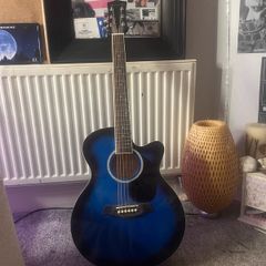 Blue acoustic bass guitar