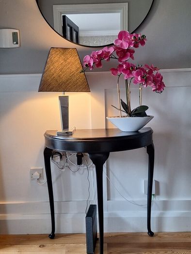 Hall table with lamp and orcid ornament