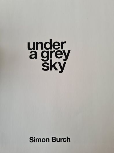 Under A GREY Sky. By Simon Burch. This Book Of Photos  Follows The landscape,people, & Towns Affected By The Collaps Of Board Na Mona's Peat Mining  Industry. IN IRELAND.