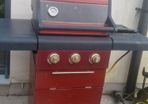 barbecue with full gas bottle