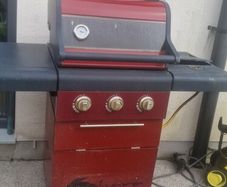 barbecue with full gas bottle