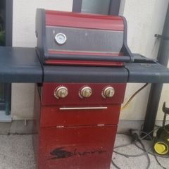 barbecue with full gas bottle