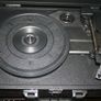 Akai A60011N Bluetooth Vinyl Turntable with Built-In Rechargeable Battery, 2 x 5 W Stereo Speakers, 3.5 mm AUX Jack, RCA Output, 3 Hours Playtime, Briefcase Style with Faux Leather Case, Black Image 4