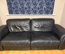 Black leather Natuzzi sofa and two chairs