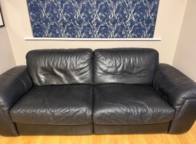 Black leather Natuzzi sofa and two chairs