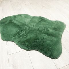 Green fur rug