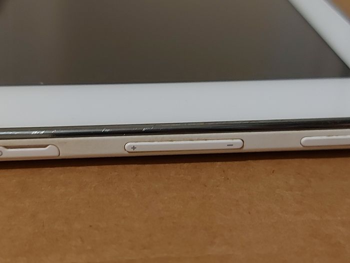 Samsung Galaxy Tab 4, Model SM-T530, 16GB, White, working great, in excellent condition and with a bunch of Family-children  movies