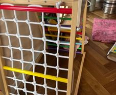 Climbing frame with slide