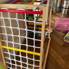 Climbing frame with slide