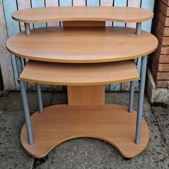 Desk with sliding shelf