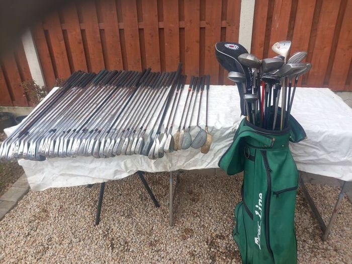 A selection of golf clubs and bags. Golf balls